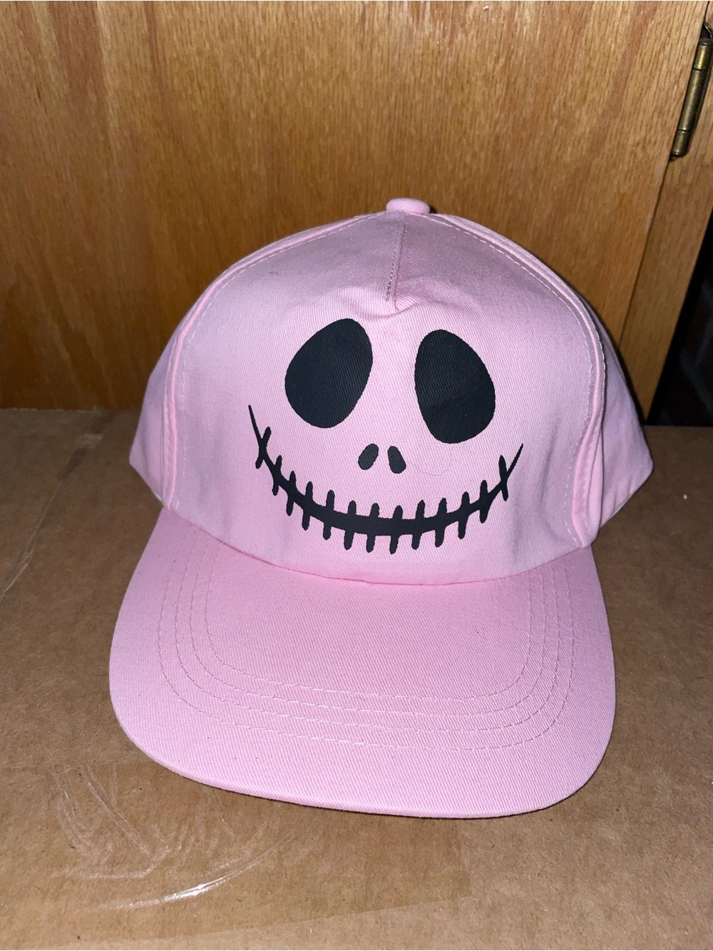 Celebrate It Pink Baseball Cap with Black Skull Smile